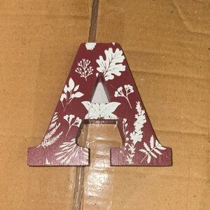 5/$5 Decorative Red Letter A with White Floral Design